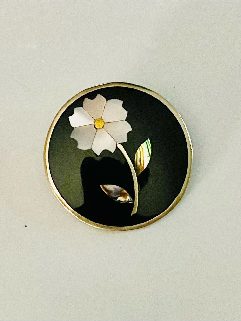 Vintage Floral Inlay Round Brooch — Black and White stamped Alpaca Mexico